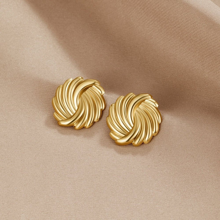 Pendientes spirales dorados 18K