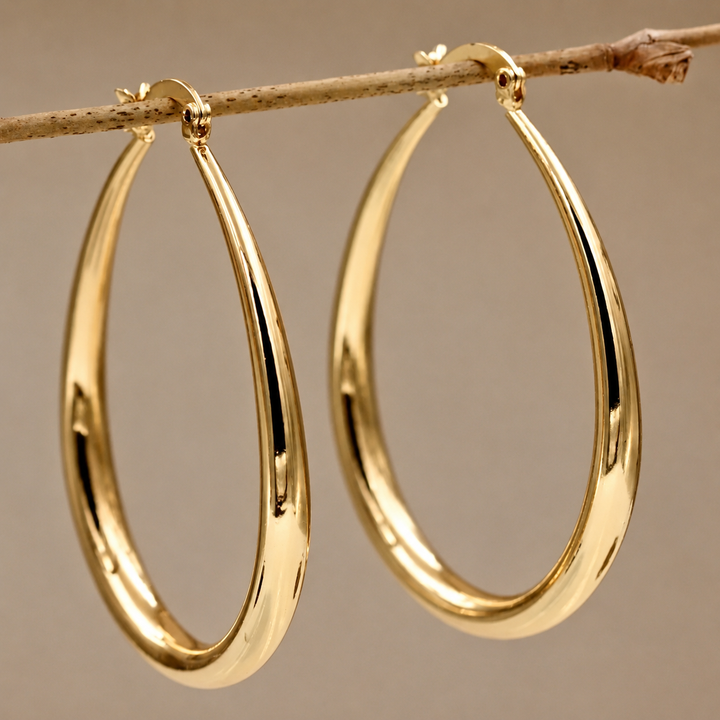 Pendientes de aro dorados élégantes