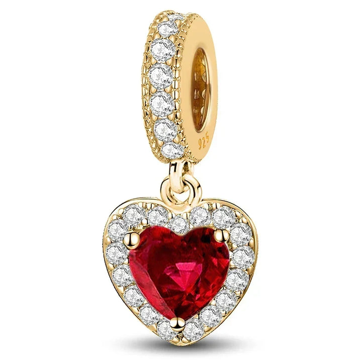Colgante de oro con corazón rojo