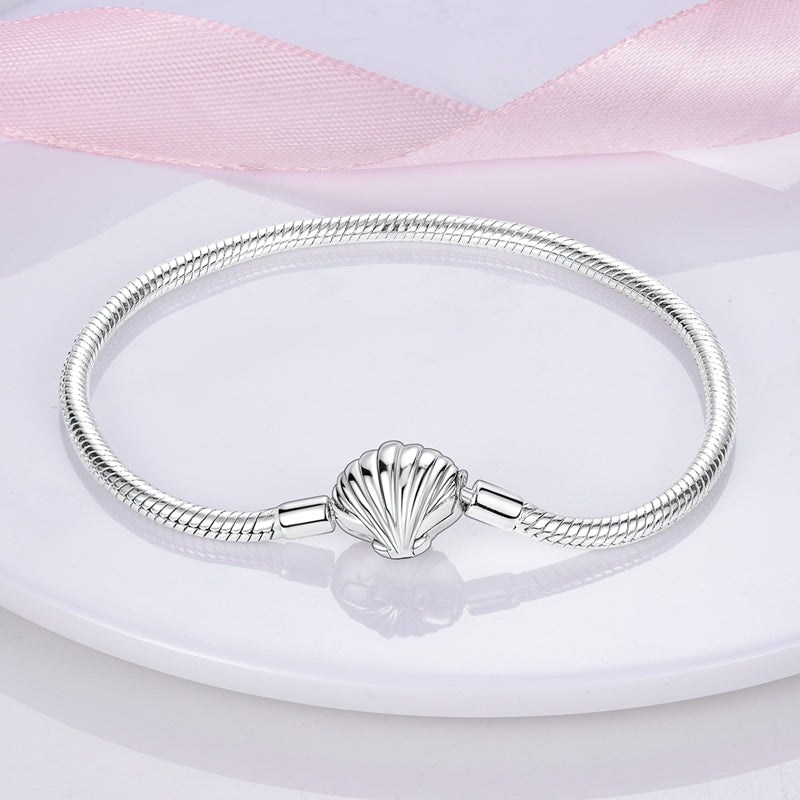 Pulsera con colgante de concha