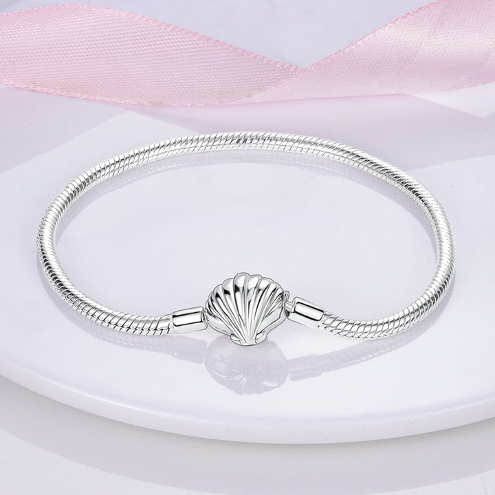 Pulsera con colgante de concha