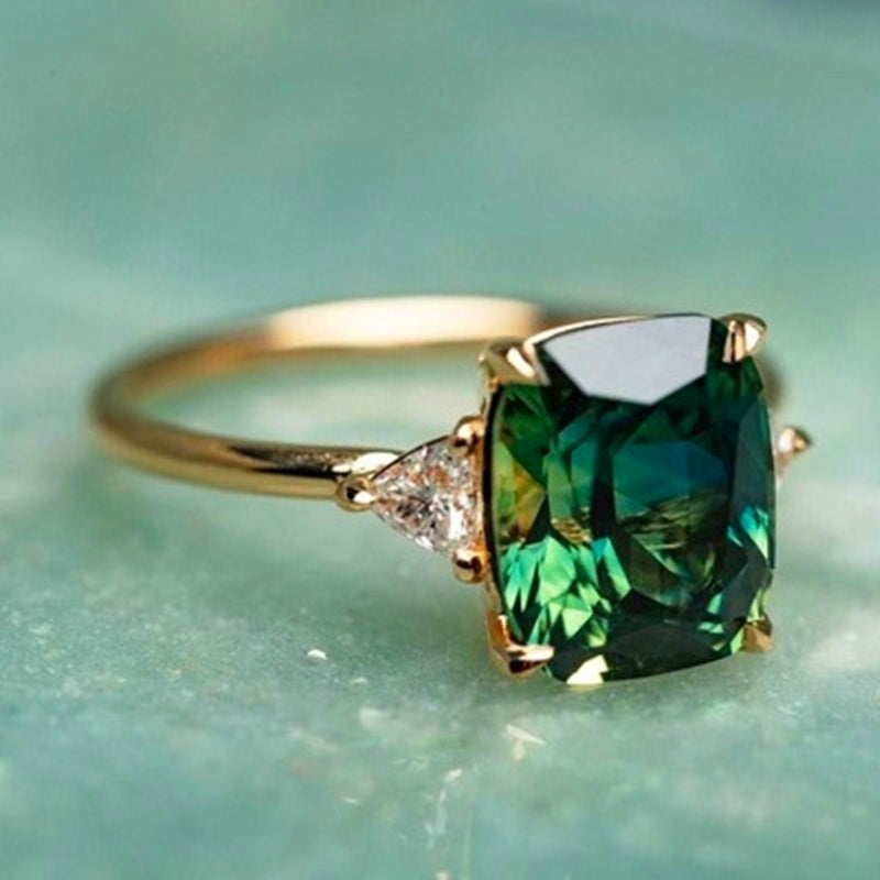 Anillo de la suerte verde circonita dorados