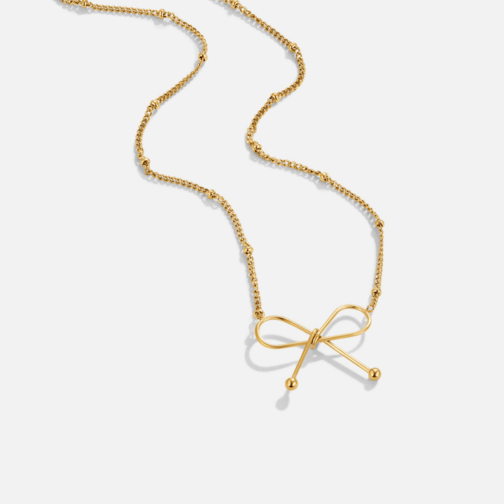 Collar dorado Anika con nudo