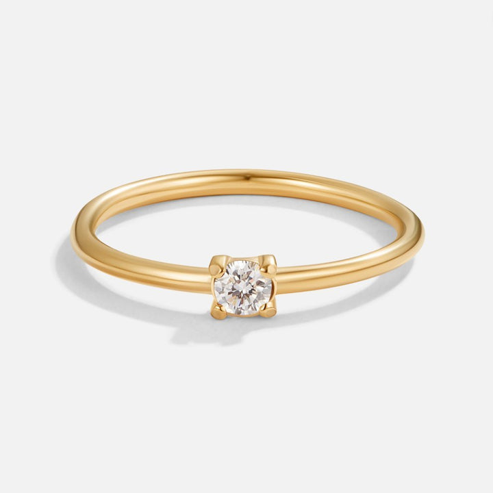 Anillo dorado 18K abril piedra de nacimiento
