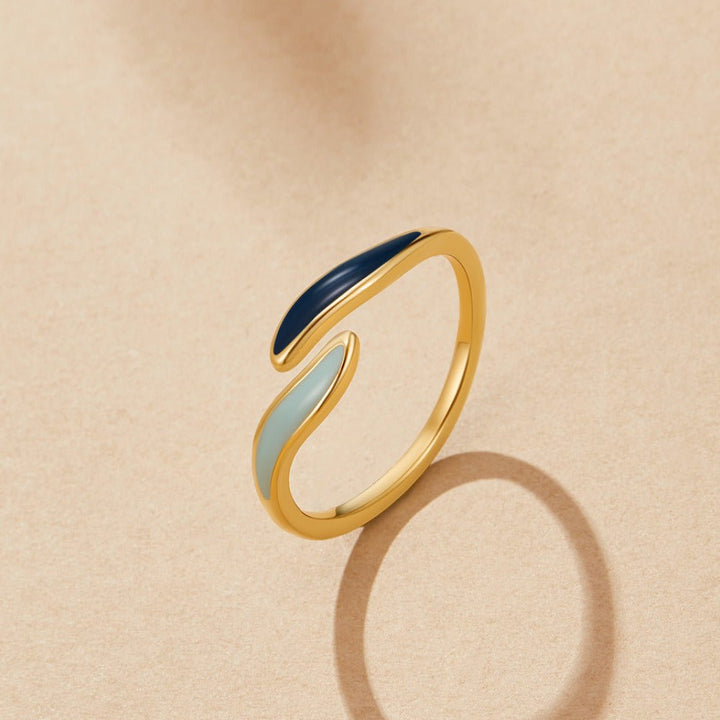 Anillo azules océaniques vagues