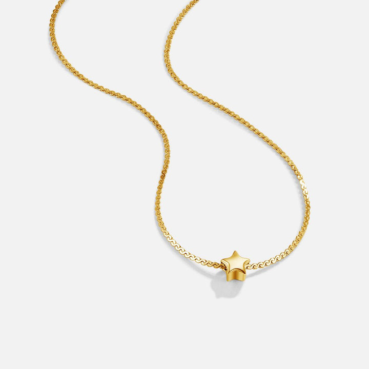 Colgante fino de estrella con cadena dorada