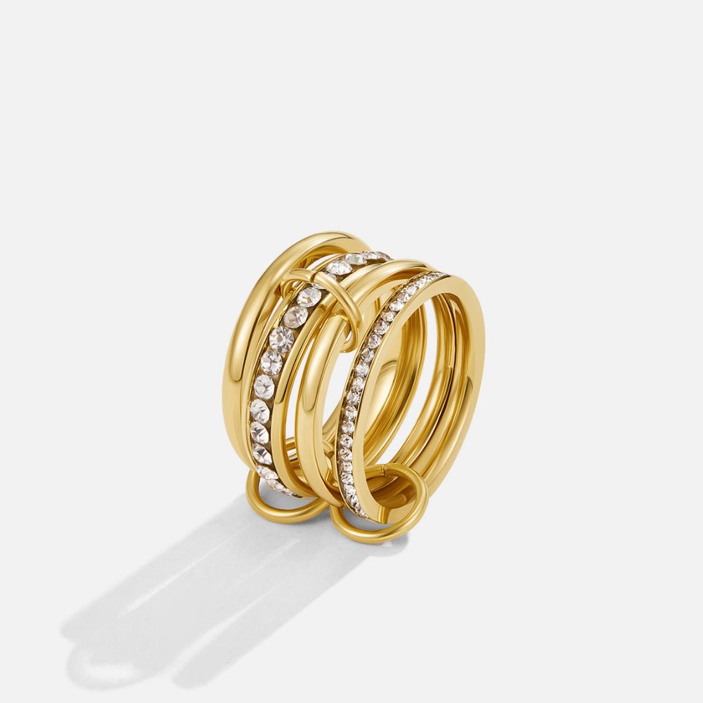 Anillo eternidad entrelazado cristal y dorado