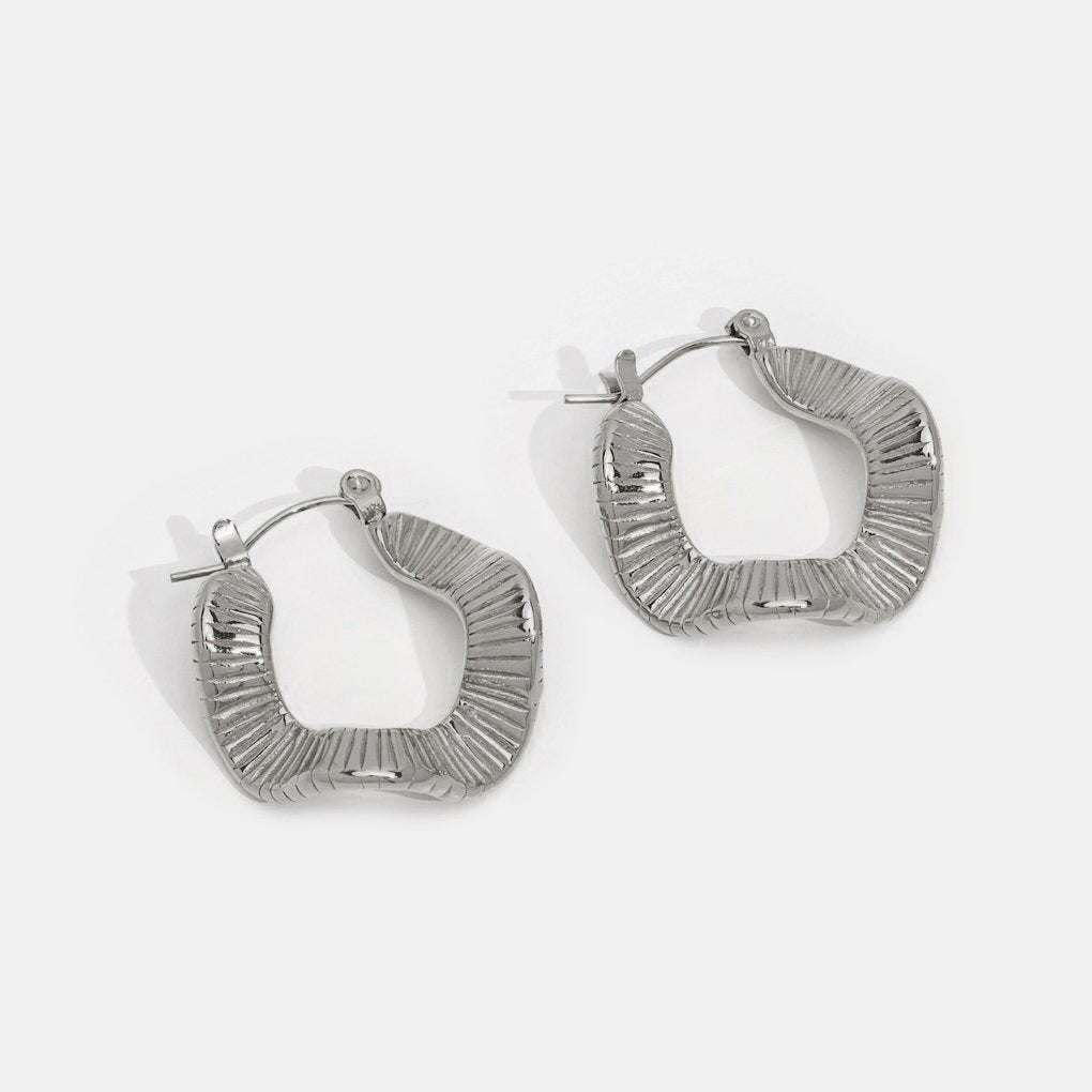 Pendientes geométricos plateados
