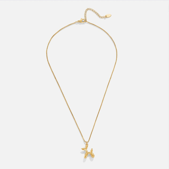 Collar dorado con colgante de animal globo