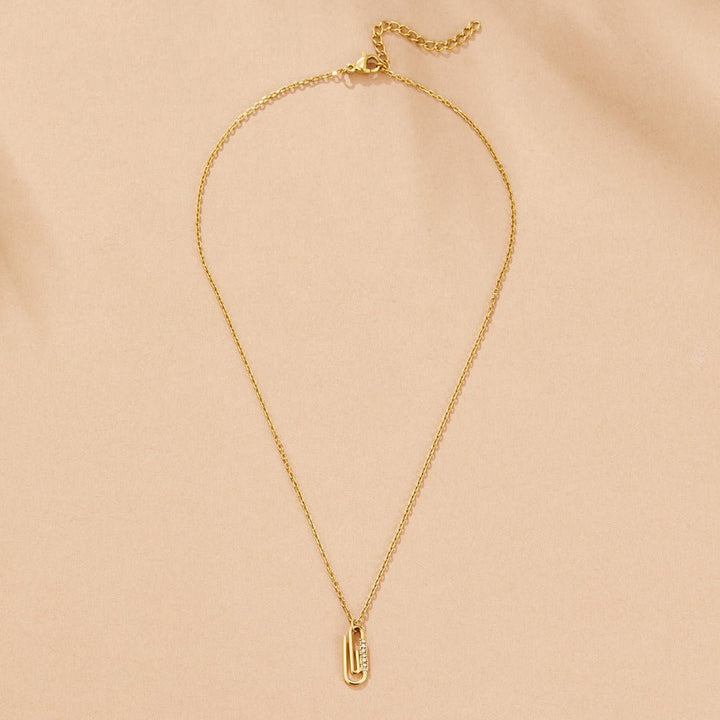 Collar con colgante de cristal dorado