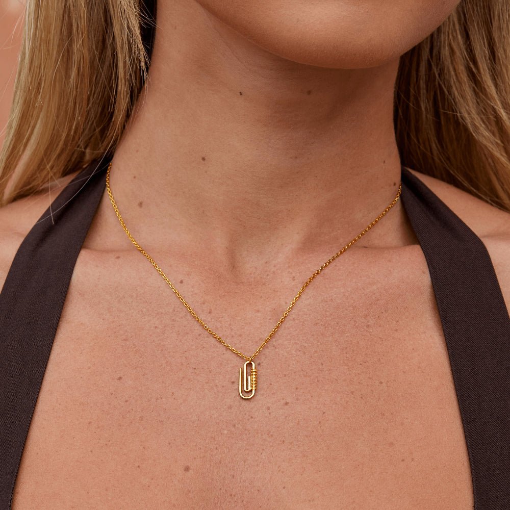 Collar con colgante de cristal dorado
