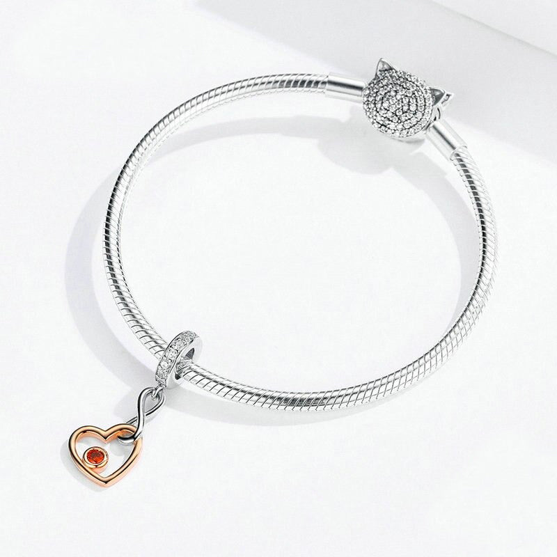 Colgante de corazón con infinito