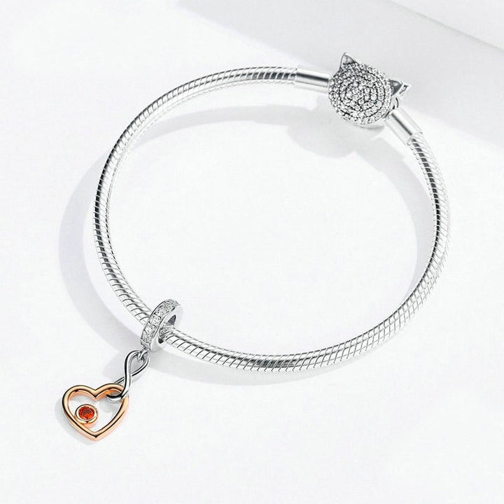 Colgante de corazón con infinito