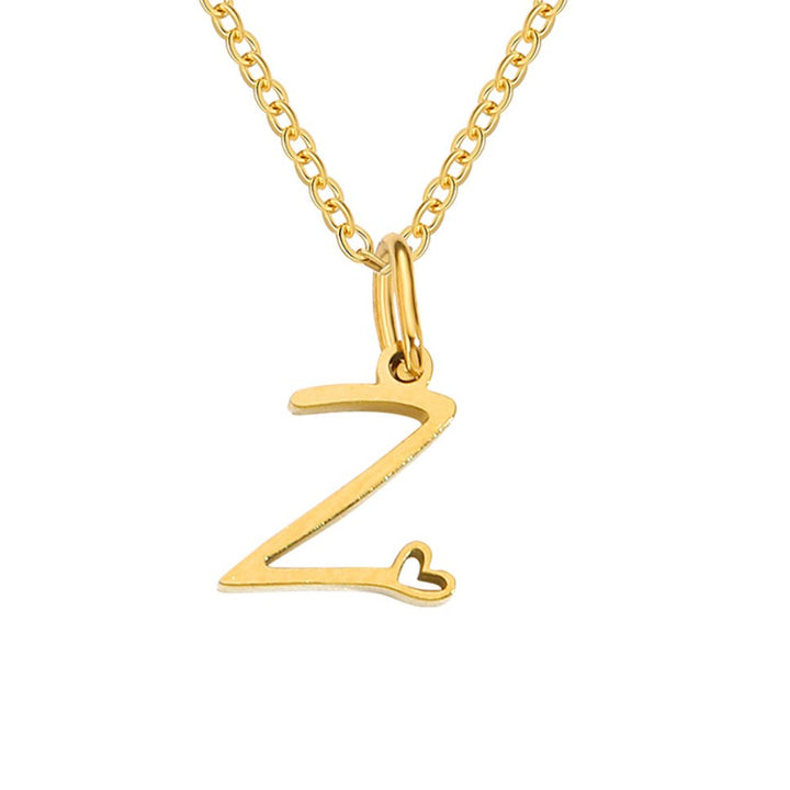 Collar dorado de corazón con inicial