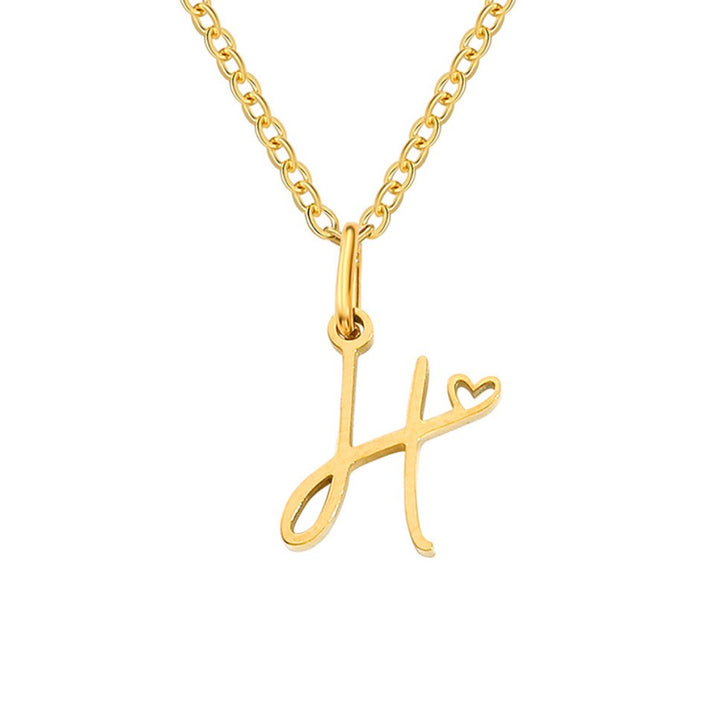 Collar dorado de corazón con inicial