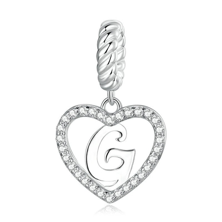 Colgante con la letra G en forma de corazón