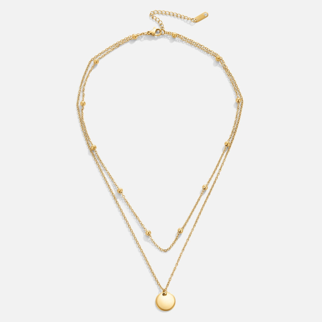 Collar multicapa con medallones