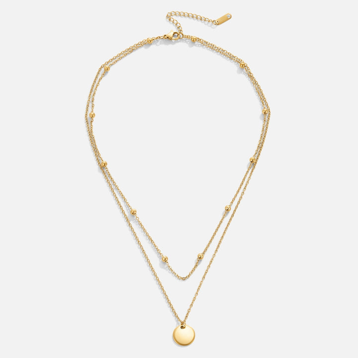Collar multicapa con medallones