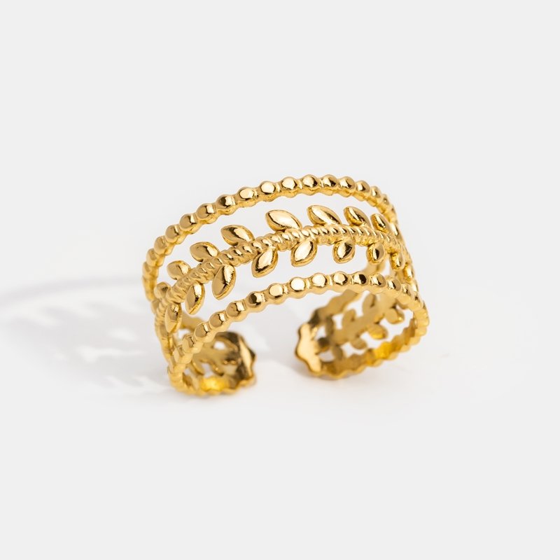 Anillo Marissa texturizado con hojas dorados