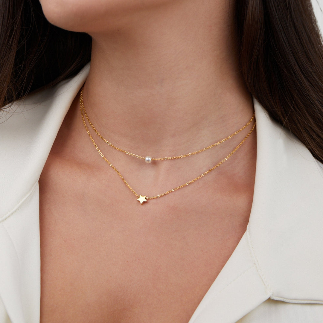 Collar dorado multicapa Estrella y Perlas