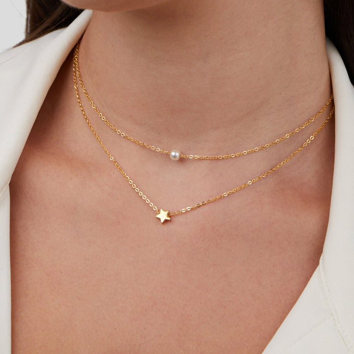 Collar dorado multicapa Estrella y Perlas