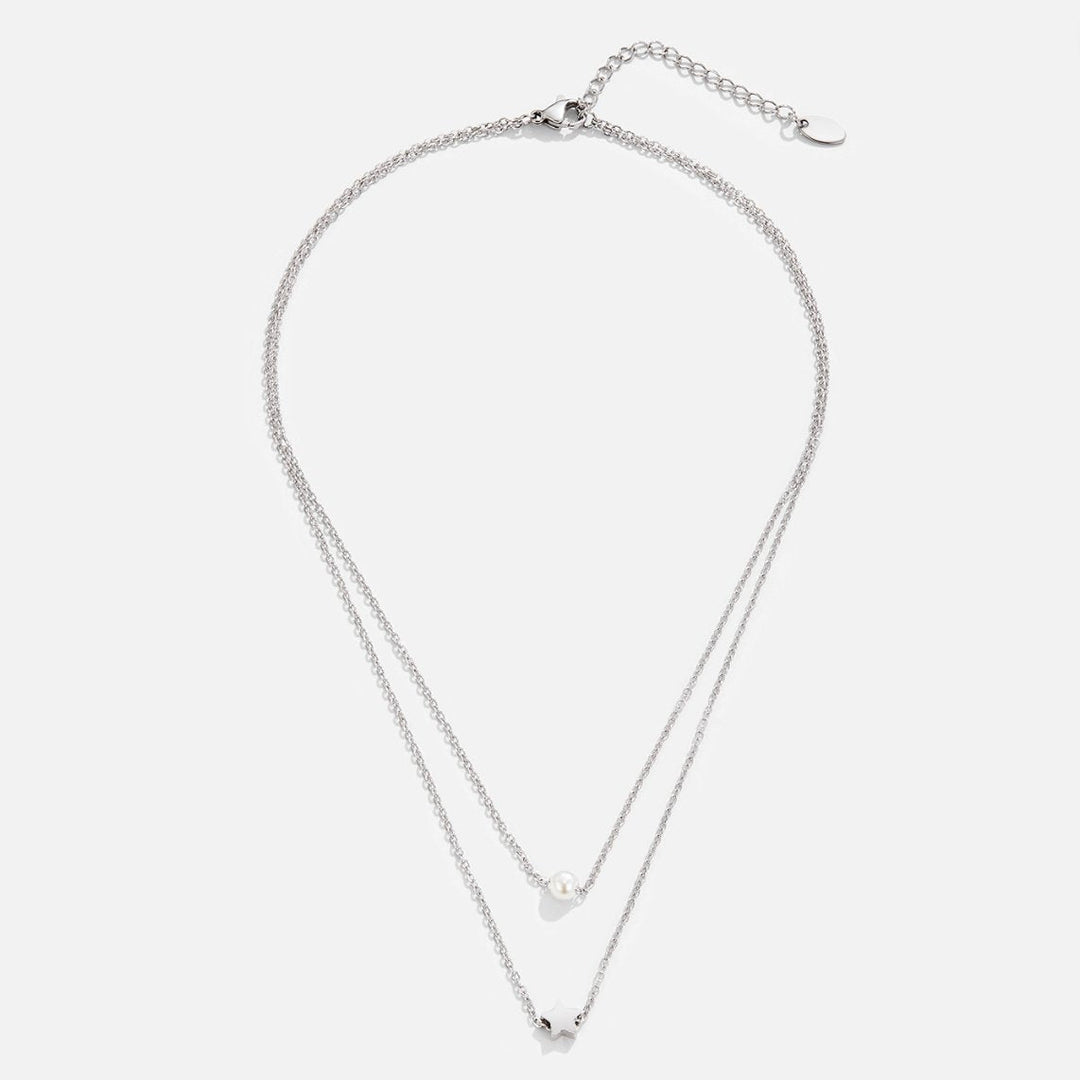 Collar de plata multicapa con estrella y perla