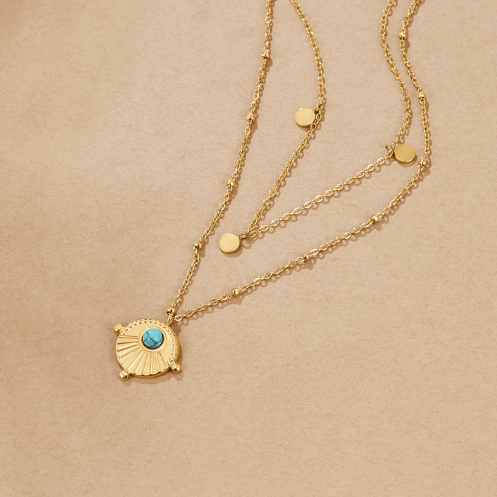 Collar multicapa turquesa