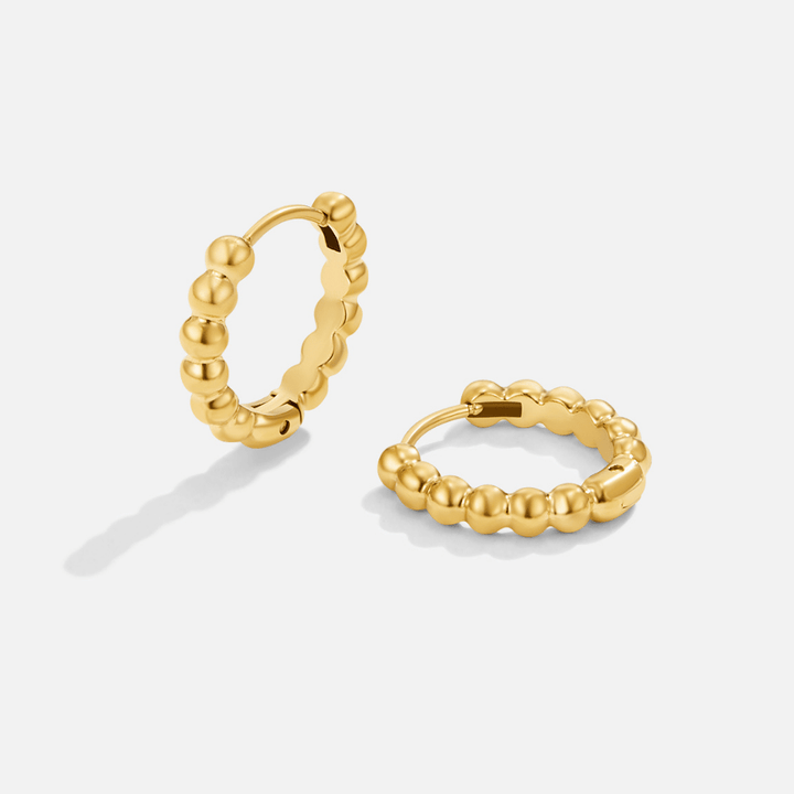 Pendientes dorados Leona con perlas