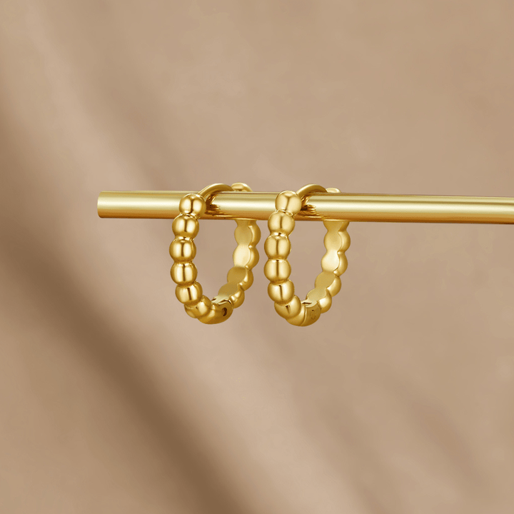 Pendientes dorados Leona con perlas