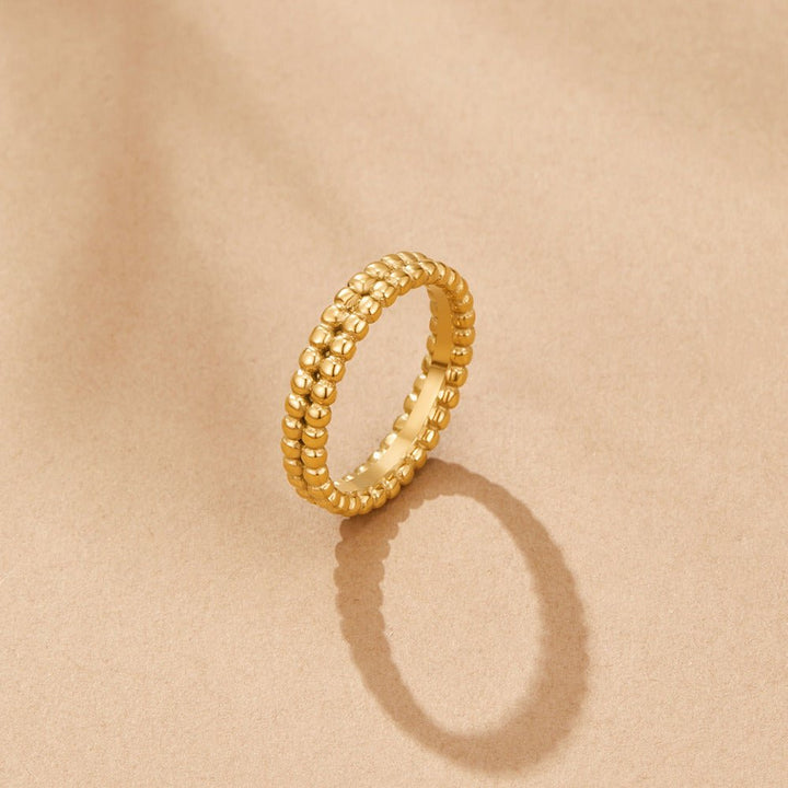 Anillo dorado Leon perlas
