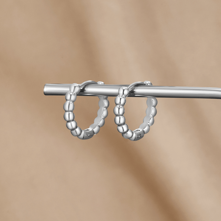 Pendientes plateados Leona con perlas