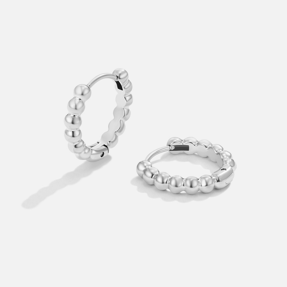 Pendientes plateados Leona con perlas