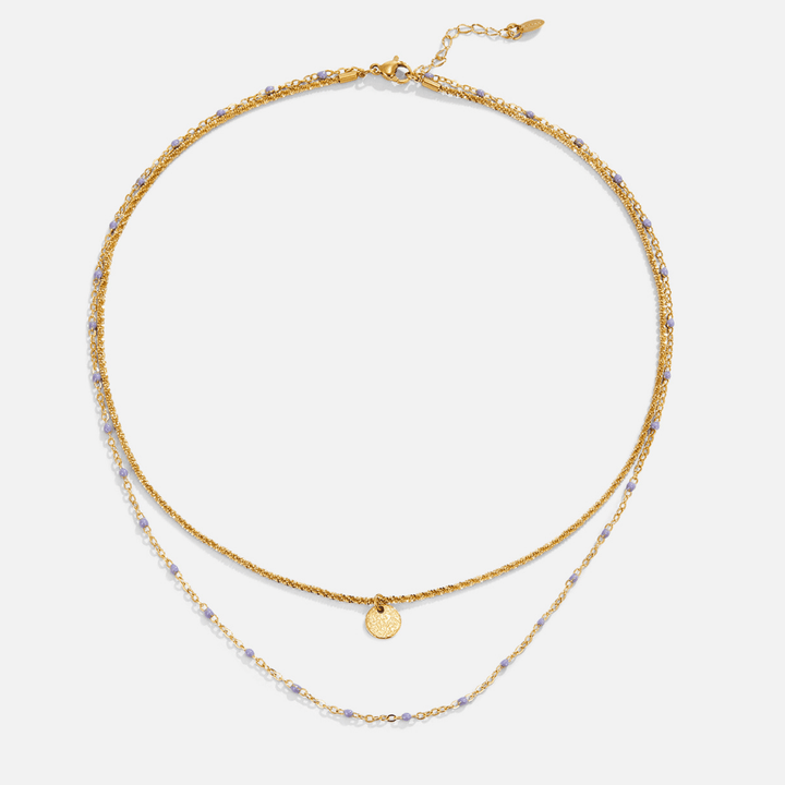 Collar dorado multicapa Lia con medallón y cuentas