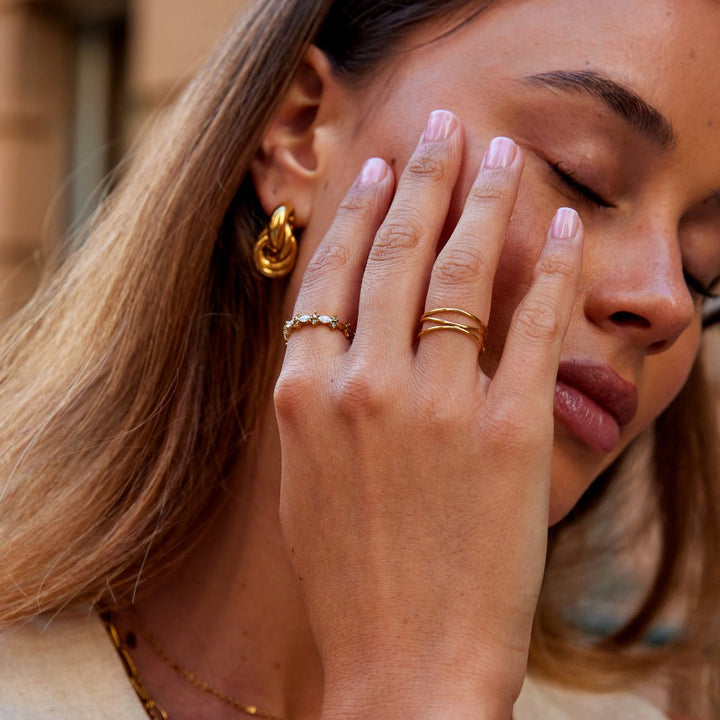 Anillo élégante cristal dorado
