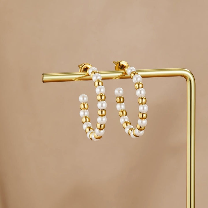 Pendientes Maia dorados con perlas