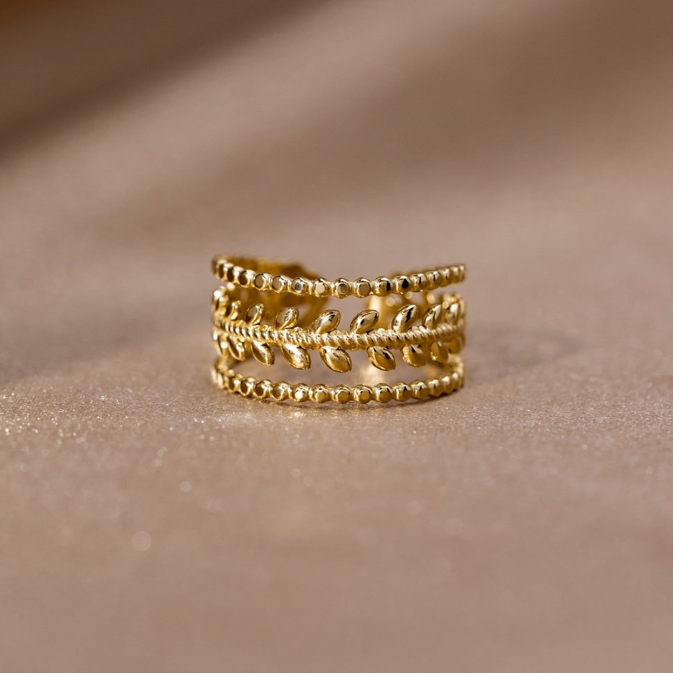 Anillo Marissa texturizado con hojas dorados
