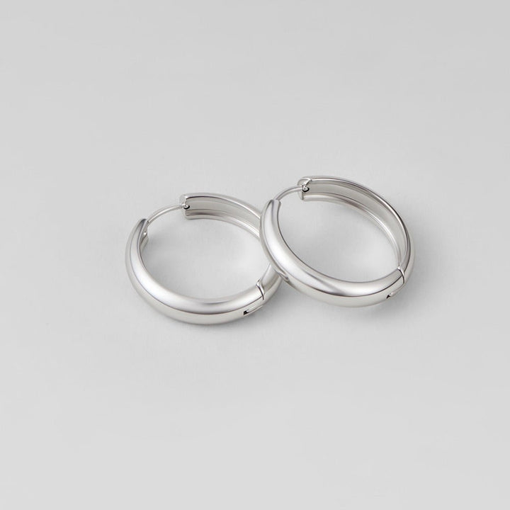 Pendientes plateados clásicos Nona