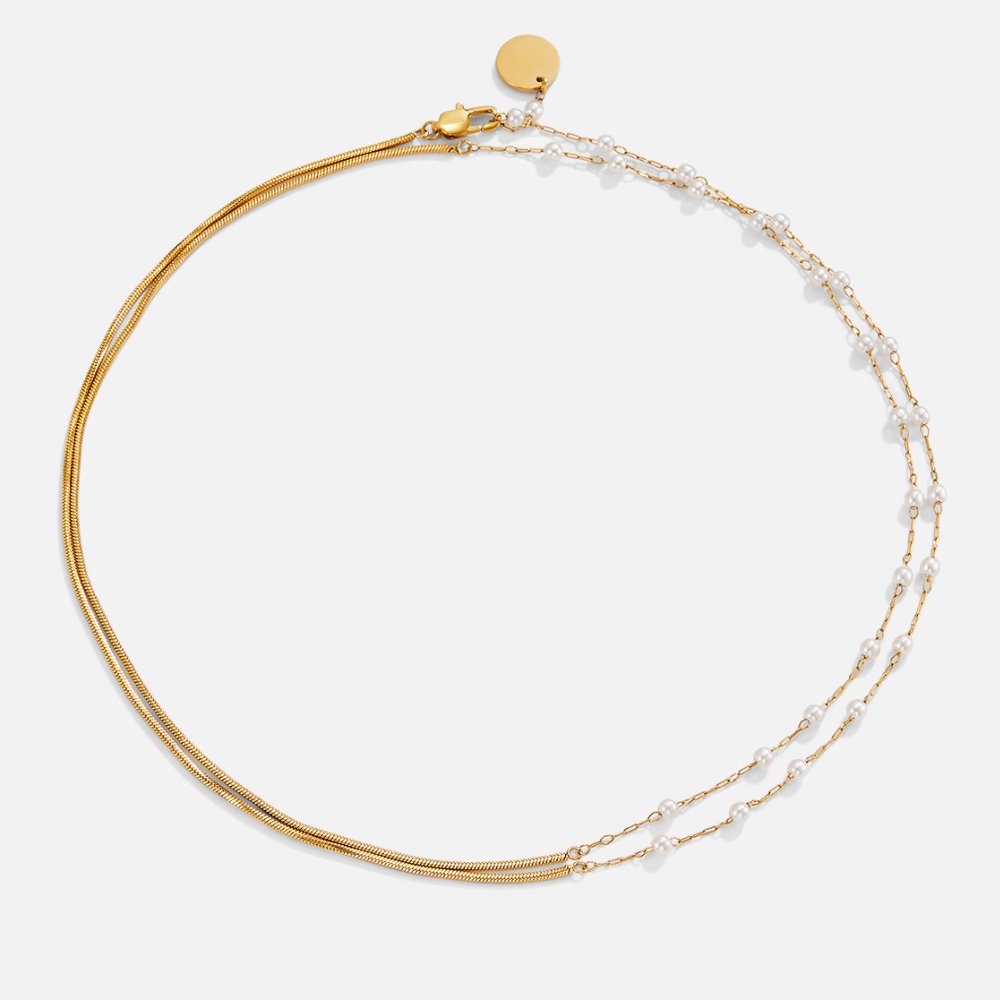 Collar de perlas y oro