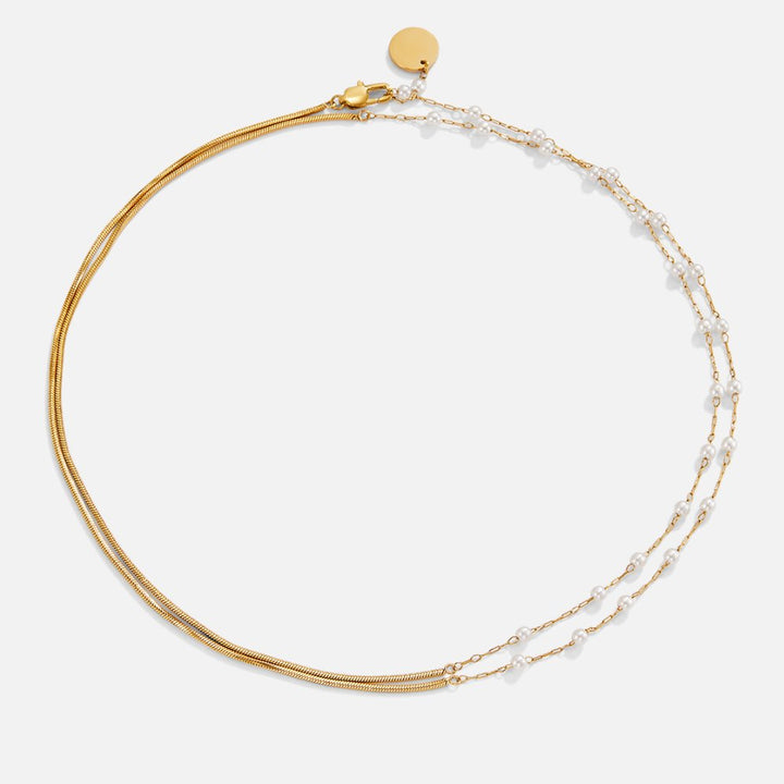 Collar de perlas y oro