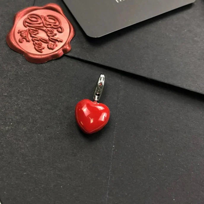 Colgante de corazón rojo