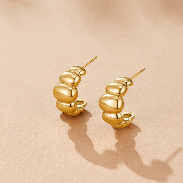 Pendientes dorados bombées Rene
