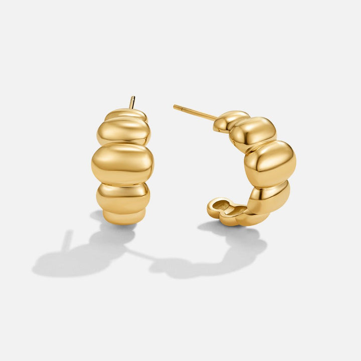 Pendientes dorados bombées Rene