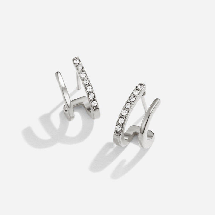 Pendientes plateados de cristal engastado con garras