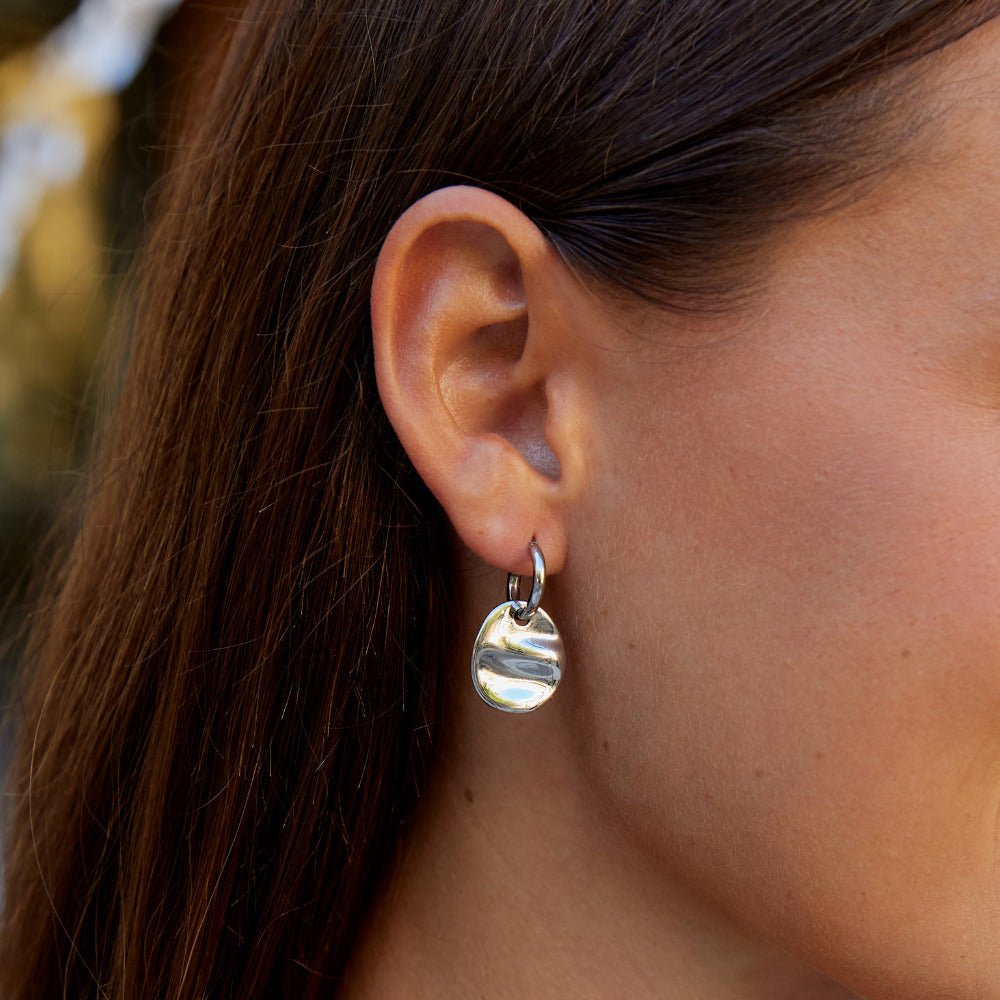 Pendientes disco plateados