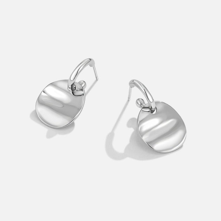 Pendientes disco plateados