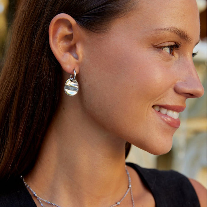 Pendientes disco plateados