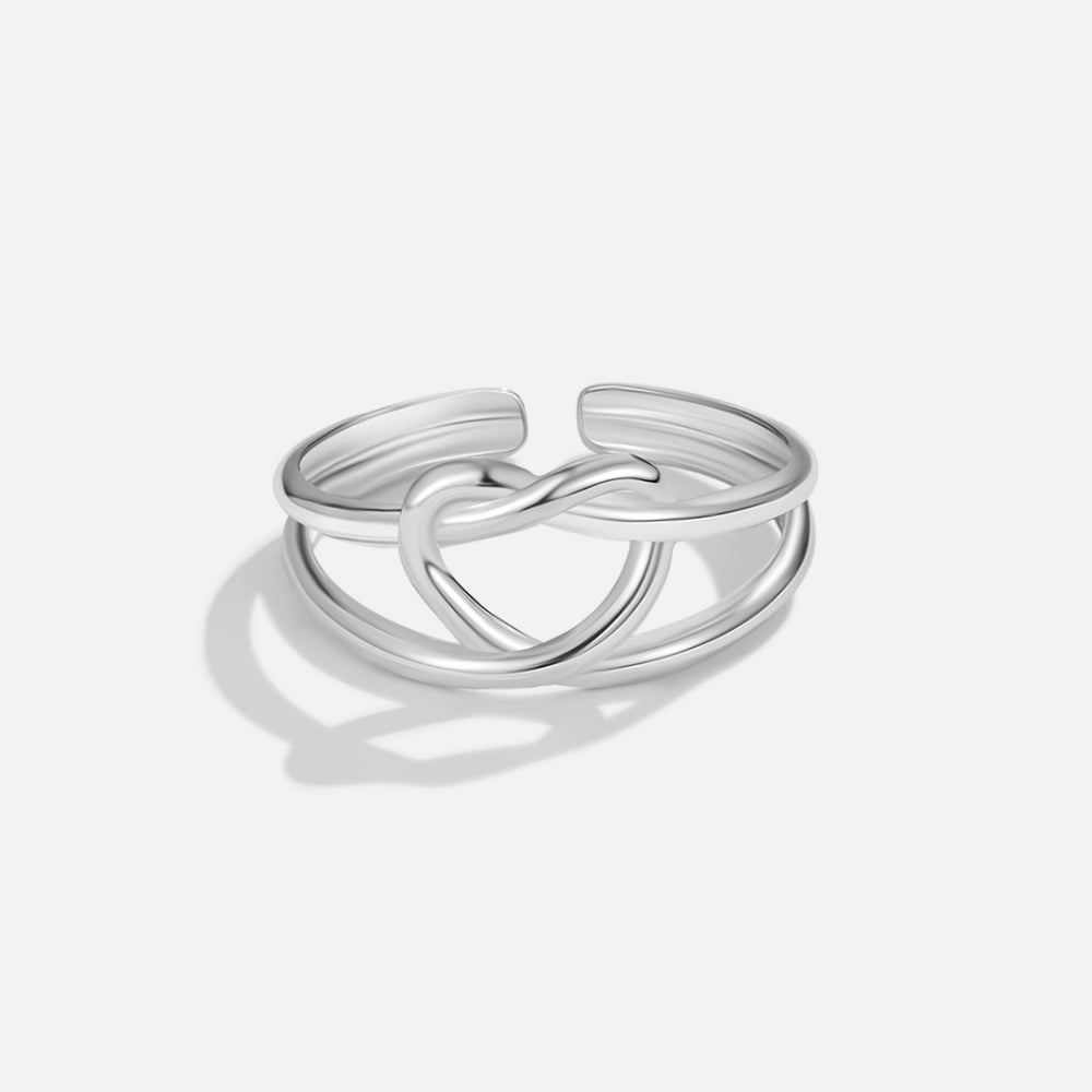 Anillo plateado amor lazo