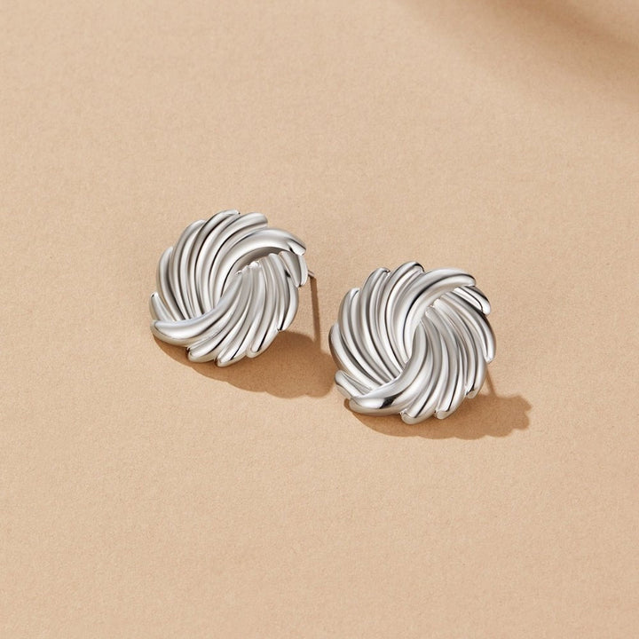 Pendientes plateados spirales