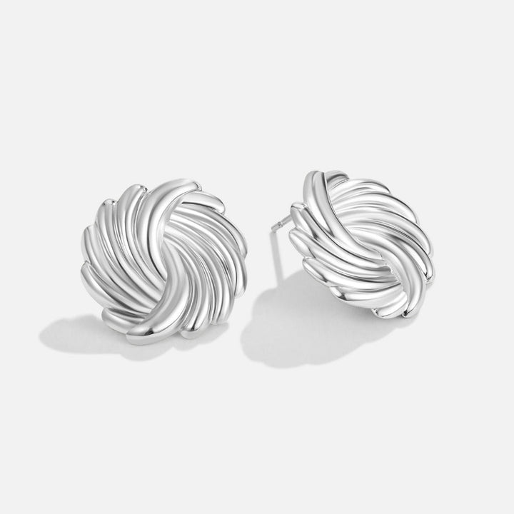 Pendientes plateados spirales
