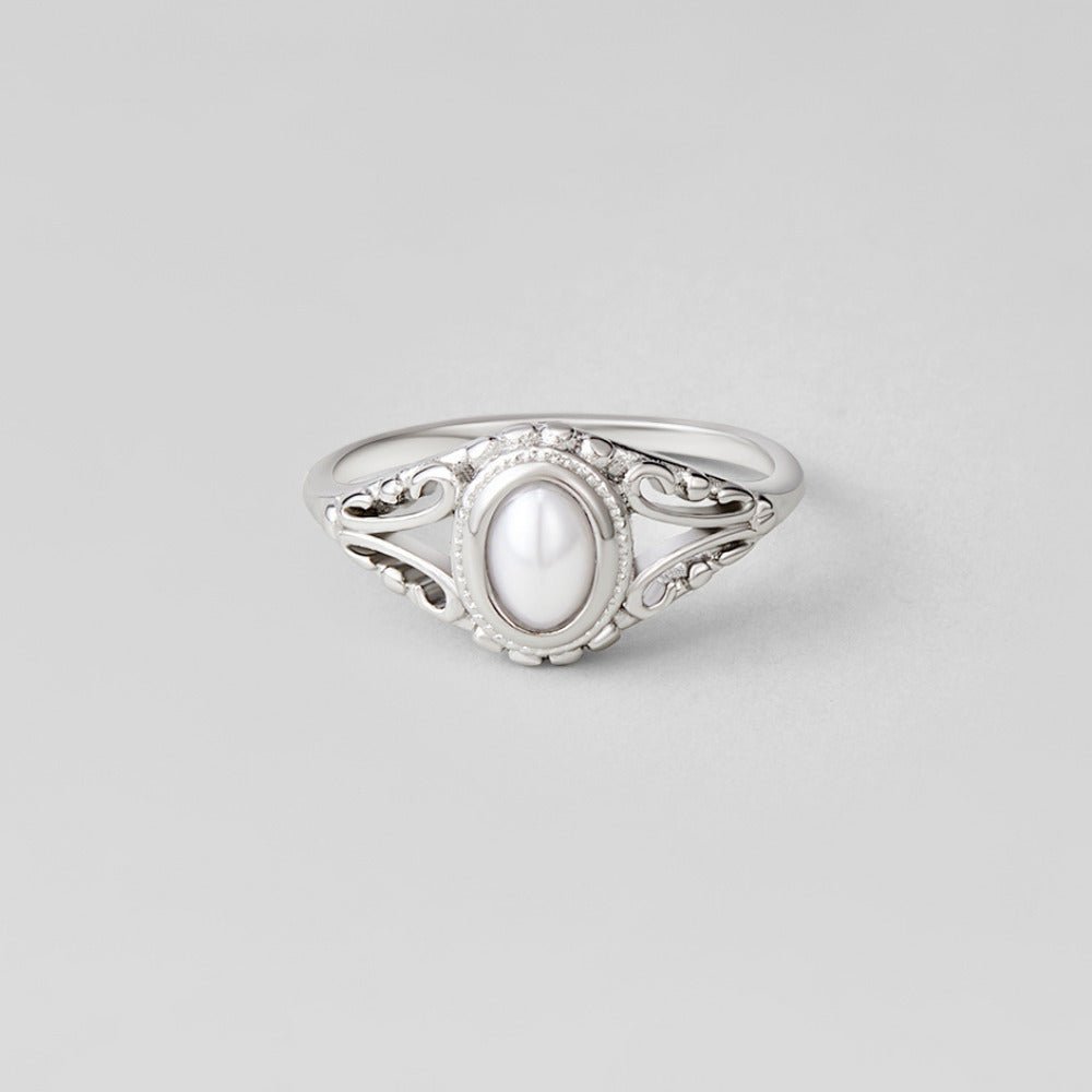 Anillo plateado vintage real perlas